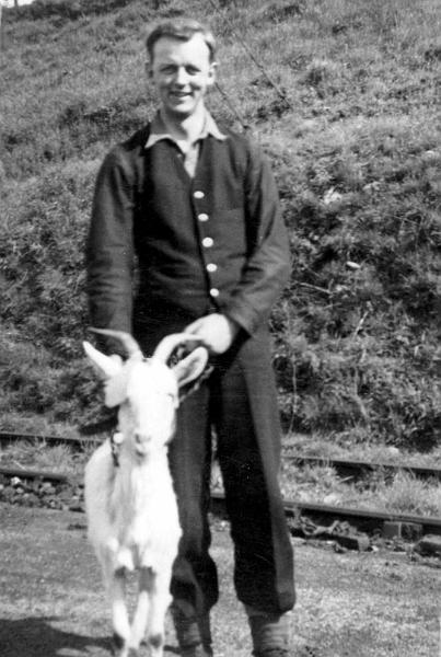 Derek Soames with Goat.jpg - Derek Soames, with a goat in transit.  Mr Soames worked his way up to signalman, and was the last signalman at the Long Preston Signal Box.   ( See The Oral History Section for a recording of Derek Soames )  